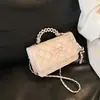 Bolsa de Ombro Feminina Nova Moda 2026 Corrente com Padrão de Diamante Transfronteiriça Estilo Chanel, Bolsa Quadrada Pequena Transversal com Laço Versão Coreana