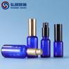 Botella de spray de vidrio azul de 10-100 ml, disponible transfronterizamente, para perfume, aceite esencial, tóner, agua de niebla fina.