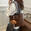 Bolsa de mão texturizada vintage 2024 outono e inverno nova bolsa de comércio exterior simples e versátil bolsa de ombro grande capacidade para deslocamento diário