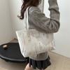 Bolso de mano informal de gran capacidad, a rayas, de moda, estilo nuevo de invierno 2025, elegante y fresco, para llevar al hombro o debajo del brazo, para mujer.
