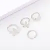 Conjunto de anillos abiertos de aleación con forma de estrella de mar y vieira, estilo navideño, de joyería europea y americana, con acabado brillante.