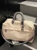 Bolsa de viaje transfronteriza para viajes cortos, bolso de mano de alta gama de gran capacidad, maleta expandible para viajes de negocios, bolsa de almacenamiento ligera para mujer