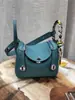 Bolsas de medicina al por mayor bolsas para mujer cuero de capa superior con textura de lichi bolsa de enfermera hombro portátil bolsa Lindi bolsa almohada Europa y Estados Unidos