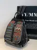 Yue Zi 2026 Otoño Temprano Nuevo Elegante Versátil Simple Casual Gran Capacidad Mezclilla Viaje Textura Retro Mochila