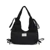 Bolsos de nicho coreanos, bolso tote grande para mujer, bolso de hombro informal de moda para el trabajo, bolso tipo cubo simple y versátil