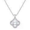 Collar de moissanita chapado en oro blanco para mujer, simple y elegante, colgante clásico de trébol de cuatro hojas, joyería de cadena para la clavícula, artículo popular de transmisión en vivo