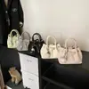 Bolso Único Tejido a Mano para Mujer 2025 Nuevo de Moda Primavera Versátil Textura de Alta Calidad Bolso Cruzado Estilo Cesta