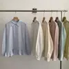 Camisa Estilo Novo Patchwork com Babados Dopamina Primavera 2026 Elegante Manga Longa Solta Redutora de Idade Top Boneca Feminino