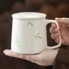 Taza de Té Verde Esmeralda del Fabricante Taza de Té de Separación para Oficina Taza de Cerámica Simple Pintada a Mano con Tapa Taza Individual