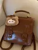 Mochila de Viagem Retro Estilo Britânico para Mulheres Inverno 2025 Nova de Aparência Elegante Simples Casual para Passeio