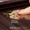 Anel Casual e de Alto Padrão em Zircônia com Laço para Mulheres, Anel de Dedo Indicador em Ouro de Areia Vietnamita, Joia Versátil e Duradoura