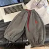 Calça de Veludo com Girassol Infantil 2025 Novo Estilo de Inverno para Meninos e Meninas, um Par de Calças Casuais Engrossadas de Inverno, Calças de Moletom Versáteis, Tendência