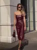 Vestido sexy sin tirantes de otoño e invierno 2024 para mujer europea y americana transfronteriza, de cuero PU, color sólido, elegante, falda dividida, corte entallado
