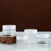 Atacado Spot Garrafa de Vidro Fosco para Creme 5G-100G Garrafa de Vidro Cosmética Tampa Branca Garrafa de Creme Garrafa de Creme