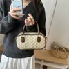 Bolso de mano de nicho estilo coreano modelo nuevo 2026 bandolera Boston bowling para salidas diarias y para ir al trabajo