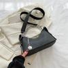 Bolso pequeño popular de este año para mujer, nuevo bolso de mensajero sencillo de moda de otoño 2023, bolso de mano informal de estilo occidental.
