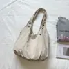 Bolso de axila de diseño nicho inspirado en el estilo coreano ins, con textura, nuevo bolso de mano 2026, color liso, bolso de hombro simple