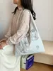 La nueva bolsa de axila de lona de nailon Henggeng con bordado de pájaros de nicho para mujer es una bolsa versátil, ligera, de secado rápido y de gran capacidad.