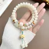 Nuevo Estilo Chino Pulsera de Raíz de Bodhi de Jade Blanco Doble Círculo Cuentas de Manzana Cuentas Budistas de Mano Pulsera Juguete para Hombres y Mujeres Rosario al por Mayor
