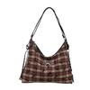 Bolso casual de moda para mujer, novedad de 2024, mochila a cuadros con lunares a juego, bolso bandolera de nicho de alta gama.
