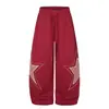 Estilo hip-hop americano, patchwork e bordados com padrão de estrelas, tecido fluido, calça de moletom larga de corte solto, unissex, versátil para dançar