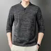 Exclusivo para comercio exterior, camiseta de punto de color liso con cuello alto y manga larga para hombre, nueva moda de primavera y otoño, top básico simple