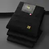 Jeans blancos de alta gama AMAL Hong Kong para hombre, corte recto, ajuste slim, nueva colección primavera 2026, pantalones casual de negocios
