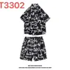 Hawaii Seaside Beach Holiday terno masculino solto plus size casal moda marca camisa de manga curta casual conjunto de duas peças