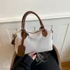Bolso de hombro grande de estilo europeo y americano, tipo soft-shell, de gran capacidad, 2026, nuevo, bolso cruzado moderno y versátil para el trabajo, bolso de mujer