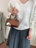 Bolso Retro de Gama Alta para Mujer 2026 Nuevo Bolso Cubo Lujo Ligero Colgante Bolso de Hombro Único Versátil para Viajar Bolso Cruzado Comercio Exterior