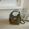 Bolso Cubo Sencillo Transfronterizo para Mujer Nuevo Estilo 2026 Moda Versátil Nicho Bolso de Hombro Único Cruzado Bolso de Mano Elegante para el Trabajo