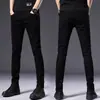 Jeans negros de alta gama italianos que no se decoloran para hombre, pantalones casuales ajustados elásticos de estilo coreano para otoño e invierno