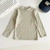 Vale do Vento 2026 Outono Novo Estilo Coreano Versátil Infantil Macio e Confortável Camiseta Básica Primavera e Outono Roupa Íntima Simples para Meninos e Meninas