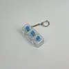 Chaveiro de botão de PC de alta transparência para descompressão 123456 chaves nove chaves grade Tianzi testador de interruptor pingente luminoso transfronteiriço em estoque