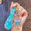 Llavero acrílico creativo con aceite, colgante con diseño de pareja de dibujos animados, llavero de coche, pequeños regalos al por mayor