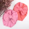 Sombreros de Bebé Simples de Otoño e Invierno Europeos y Americanos Sombreros Indios Sombreros de Pulóver Tejidos Sombreros de Niños con Lazo Sombreros de Bebé