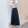 Liquidación de Verano 2026 Conjunto de Dos Piezas de Moda y Versátil: Blusa de Gasa + Falda de Cintura Alta 310/D2