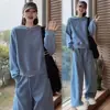 Conjunto de Traje Casual de Moda para Mujer 2026 Primavera y Otoño Nuevo Estilo Elegante Adelgazante Rejuvenecedor Sudadera con Capucha de Cuello Redondo Pantalones de Pierna Ancha Conjunto de Dos Piezas