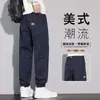 Pantalones casuales grises de otoño para hombre, corte holgado, con puño, pantalones de nueve puntos, marca de moda nueva 2026, pantalones deportivos tipo harén con retazos