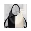 Bolso de mujer transfronterizo 2026 nueva moda versátil con bloques de color tipo cesta bolso de mano elegante bolso de hombro cruzado