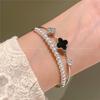 Pulsera de trébol de cuatro hojas dulce de flor micro-incrustada de doble capa 2024 para enviar pulsera de novias joyería nicho joyería para mujer