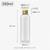 Suministro directo en stock de botellas de plástico PET transparentes con tapas de aluminio doradas y plateadas, botellas dispensadoras altas y delgadas, botellas de embalaje de viaje portátiles