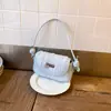 Bolsa de Design de Nicho de Luxo Feminina 2025 Novo Estilo Fresco Bolsa de Mão Transversal Moda Cor Contrastante Semicírculo Bolsa Sela