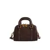 Bolsa de mão pequena retrô feminina 2025 nova moda textura bolsa de ombro transversal coreana versátil simples bolsa tote almofada