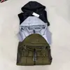 CP Cross-Border COMPANY design falso de duas peças, apresentando mangas separadas em malha canelada e uma jaqueta de algodão com capuz, em um estilo de moda urbana
