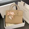 Bufanda de Seda Estilo Francés Bolso Kelly 2026 Nuevo Versátil Bolso de Hombro para Viajar Bolso de Mano Retro con Textura para Mujeres Transfronterizo