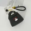 Colgante Creativo de Macarrón Regalo Cuerda Trenzada a Mano Bolsa para Llaves Dibujo Animado Sanrio Color Caramelo Billetera Pequeña al por Mayor