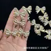 ABS Estampado en Oro Perla Sintética 22*29 Moño Pulsera DIY Cadena para Teléfono Colgante para Coche Accesorios Cuentas Moda Venta al por Mayor