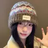 Versátil sombrero de lana para otoño e invierno, moderno sombrero Lei Feng, gorro de punto, elegante y cálido, versión coreana, protege las orejas, favorece el rostro