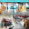 Puerta de persiana enrollable eléctrica de aleación de aluminio de doble capa con una puerta pequeña adicional, diseñada para resistencia al viento, prevención de robos y operación automática; adecuado para garajes, fábricas y aplicaciones industriales como puerta elevable